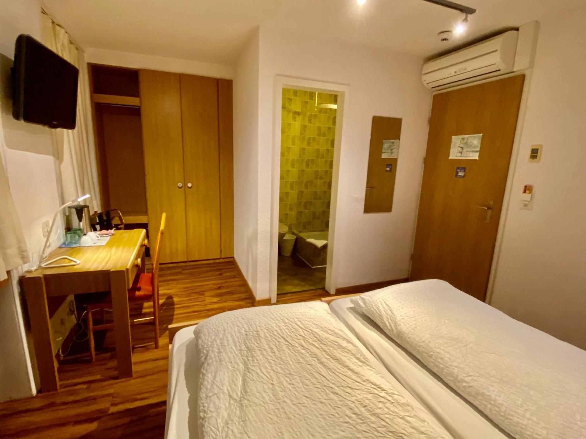 Hotel Toscana Интерлакен Стая снимка